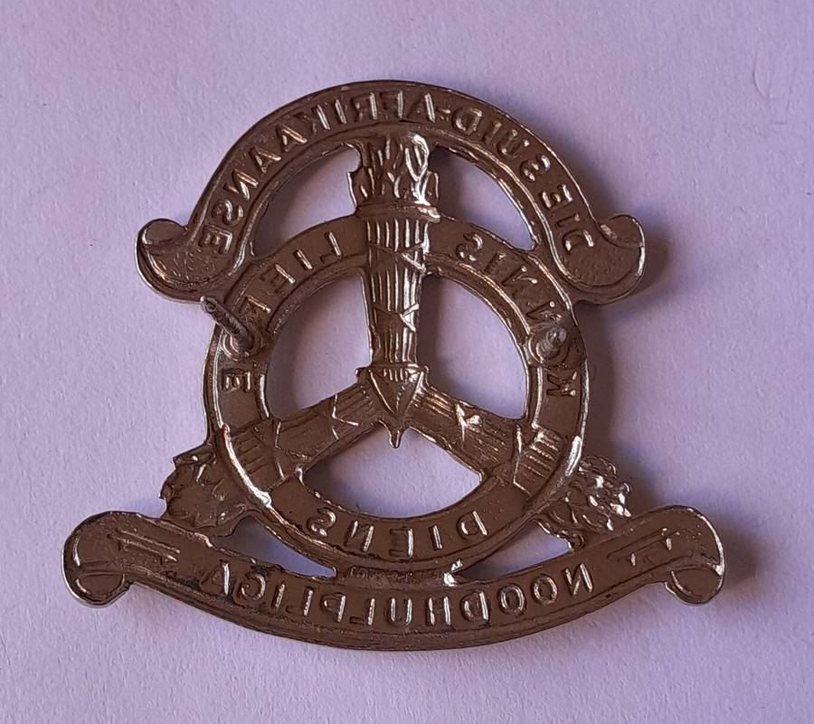 SA Noodhulp Liga Cap Badge.  Pins Intact.
