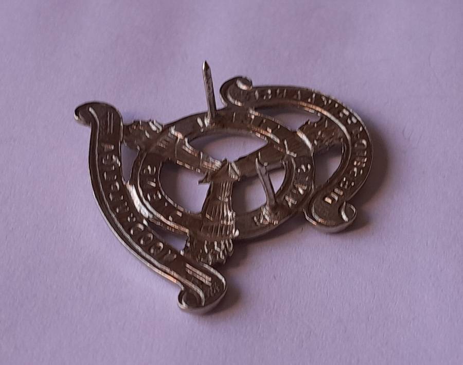 SA Noodhulp Liga Cap Badge.  Pins Intact.