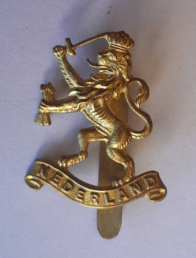 WW2 Netherlands Dutch Army in Exile Cap Badge.  JR Gaunt. Slider Intact.