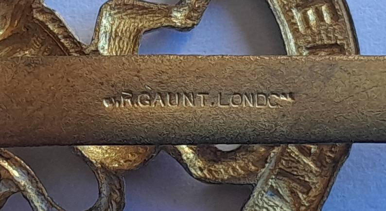 WW2 Netherlands Dutch Army in Exile Cap Badge.  JR Gaunt. Slider Intact.