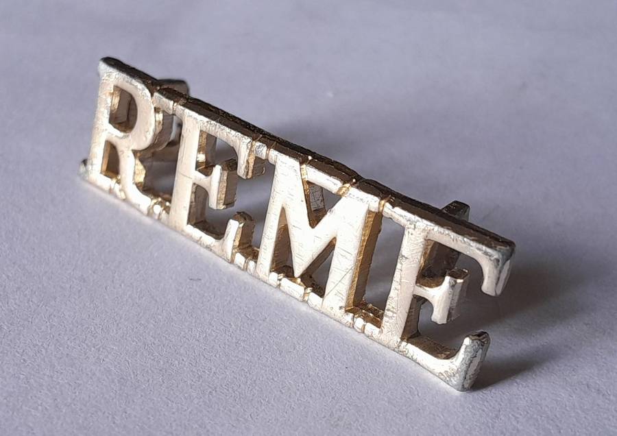 British Royal Electrical Mechanical Engineers Anodised Aluminium Shoulder Title.