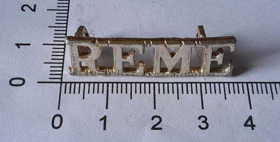 British Royal Electrical Mechanical Engineers Anodised Aluminium Shoulder Title.
