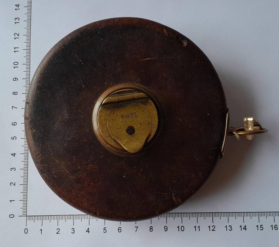 Antique Leather Cased 66ft Wind Up Measuring Tape with Brass Handle.