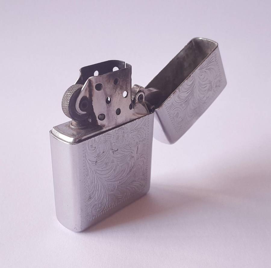 Vintage Zippo Lighter With Engraved Case.