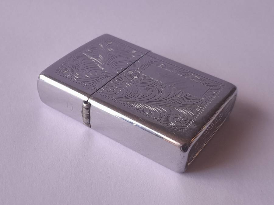 Vintage Zippo Lighter With Engraved Case.