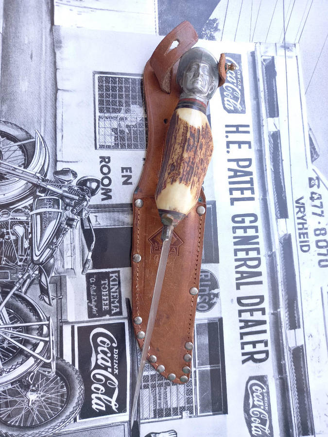 1961 Puma Hunting Knife: Solingen German Blade with custom settler head hilt top and Ivory handle