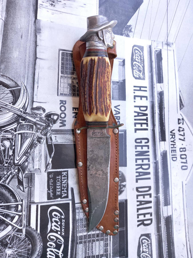 1961 Puma Hunting Knife: Solingen German Blade with custom settler head hilt top and Ivory handle