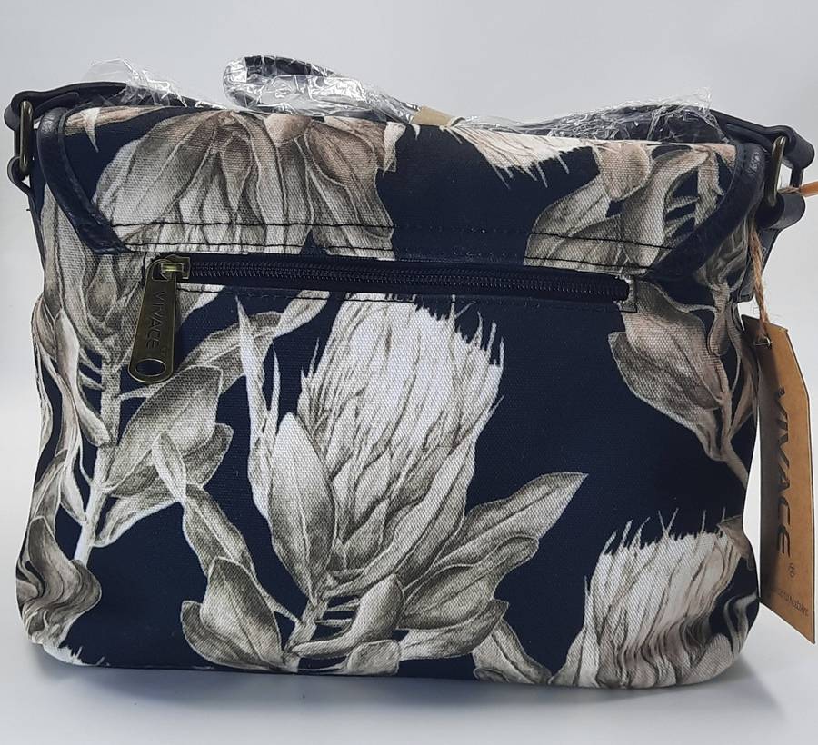 Stunning,Sophisticated And Trendy Shouder Sling Bag BY Vivace ! Black and white Protea design.