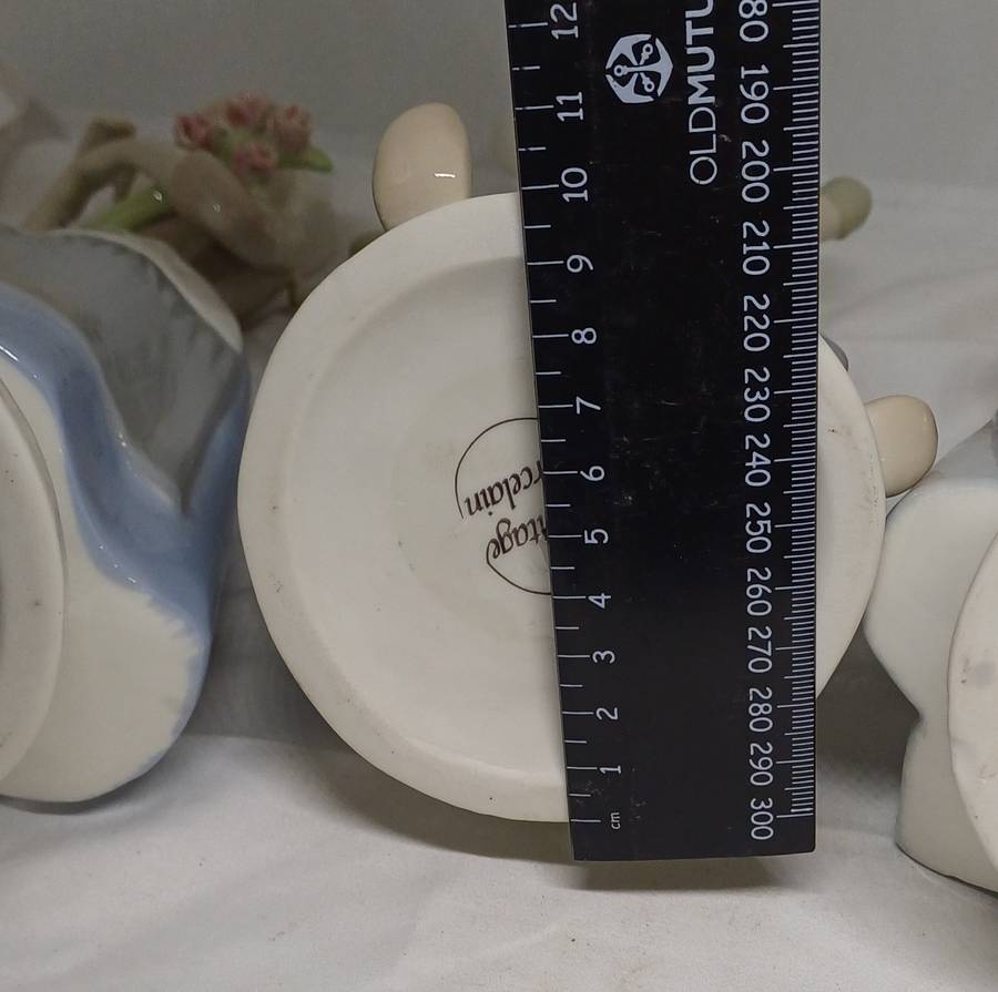 HERITAGE PORCELAIN  FIGURINES