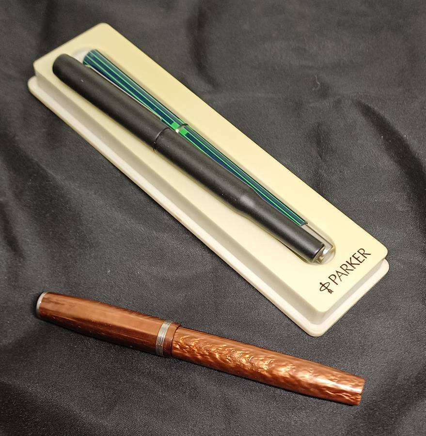 Esterbrook fountain pen and two Parker pens