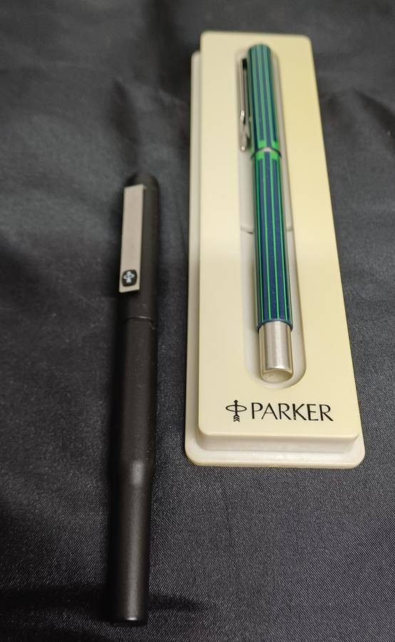 Esterbrook fountain pen and two Parker pens