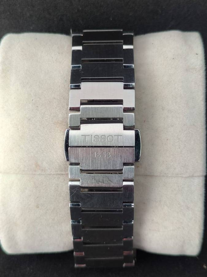 Tissot PRX Powermatic 80 35mm black dial.