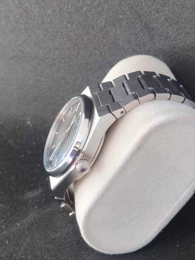 Tissot PRX Powermatic 80 35mm black dial.