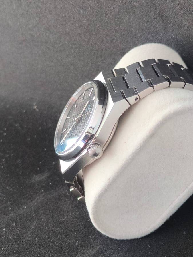 Tissot PRX Powermatic 80 35mm black dial.
