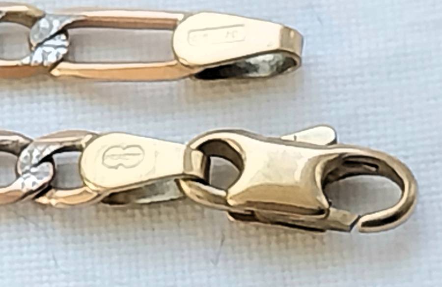 GENUINE 9 CT GOLD FIGARO-LINK BRACELET.