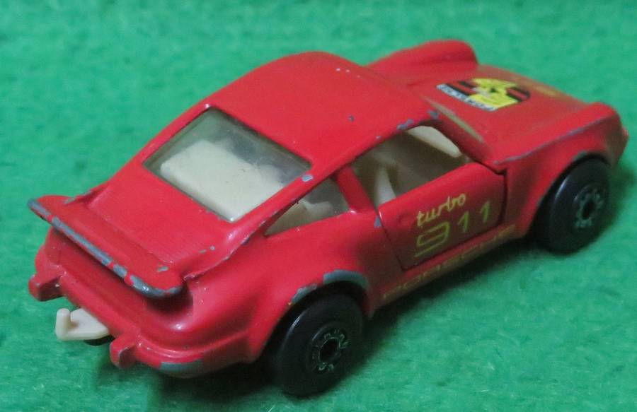 Matchbox Toys Ltd**Porsche 911 Turbo**Made in Macau**1978**Metal base**Doors open**