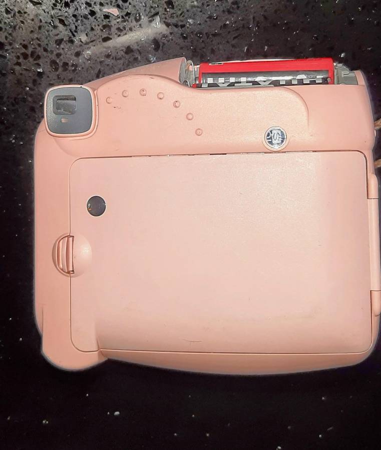 Pink polaroid Instax mini 8 camera.Auto adjust.