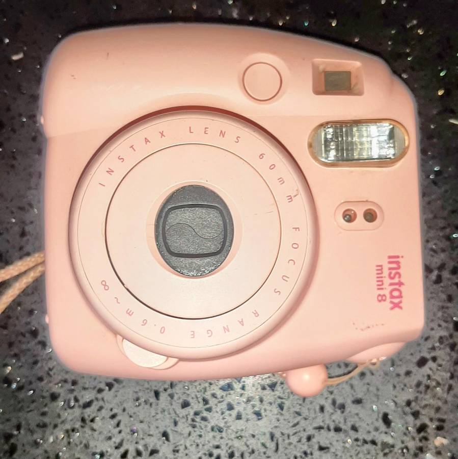 Pink polaroid Instax mini 8 camera.Auto adjust.