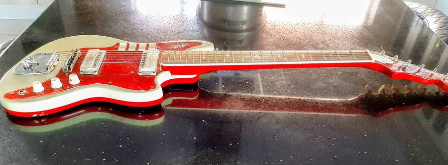 Vintage 1963 Zenon Japanese made guitar in original box.Need TLC.
