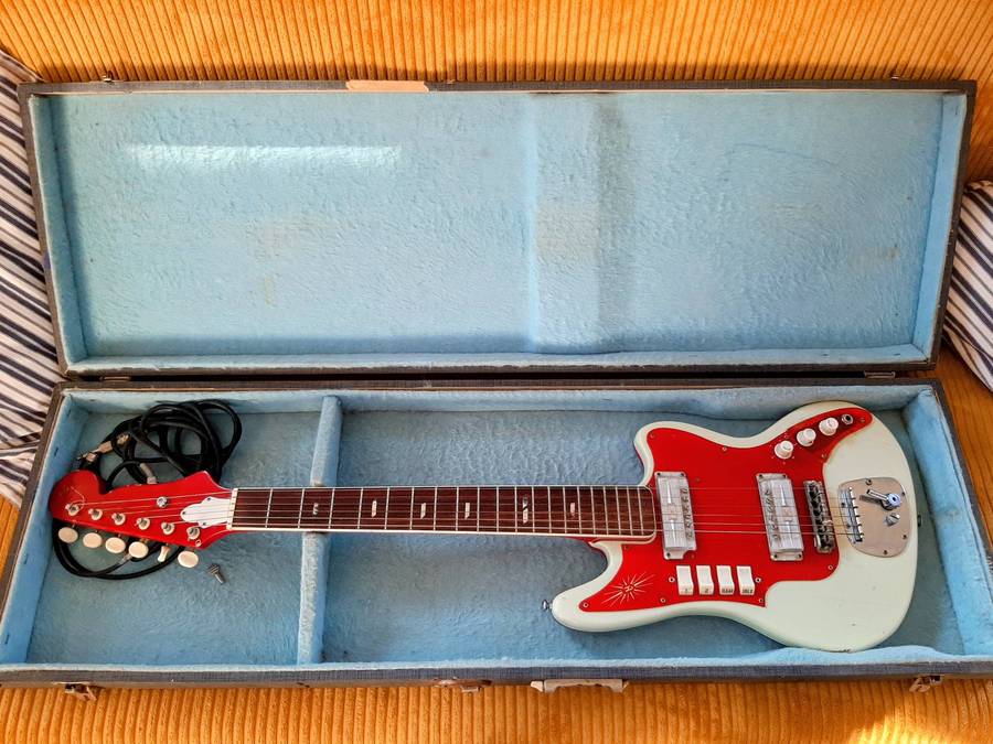 Vintage 1963 Zenon Japanese made guitar in original box.Need TLC.