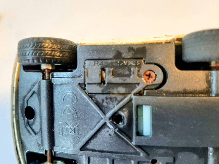 Vintage die-cast model of a 1955 Ford Thunderbird. This model is a replica.