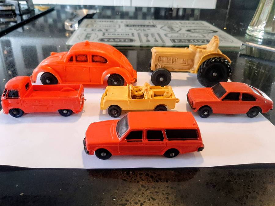 Vintage rubber toy cars, likely from the Norwegian brand Tomte Laerdal.