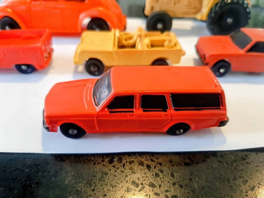 Vintage rubber toy cars, likely from the Norwegian brand Tomte Laerdal.