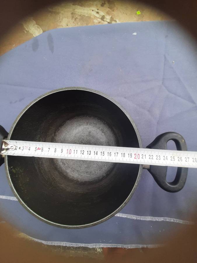 Woll Titanium Nowo Induction Pot. It is a cast aluminum pot with a non-stick titanium alloy coating.