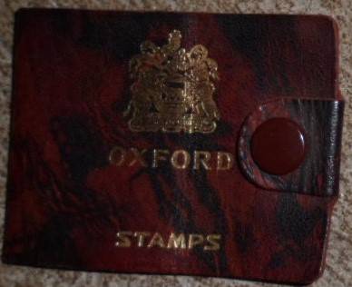 Very rare vintage, leather postage stamp holder.