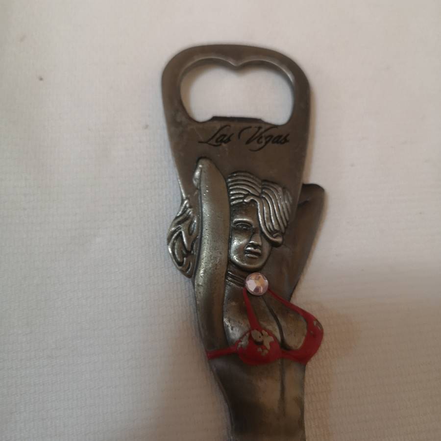 Rare 1980s Las Vegas 9 bottle opener. Beautiful Women cut out.