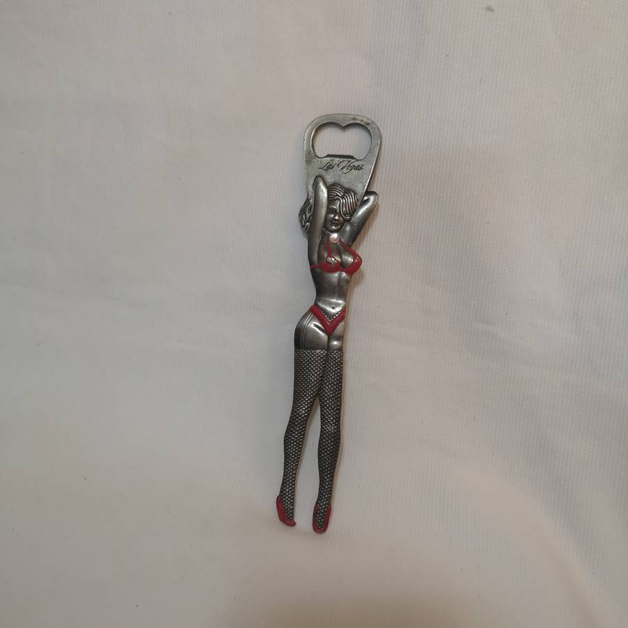 Rare 1980s Las Vegas 9 bottle opener. Beautiful Women cut out.