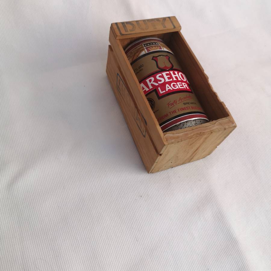 Parody Beer can in Crate- A##hole Lager