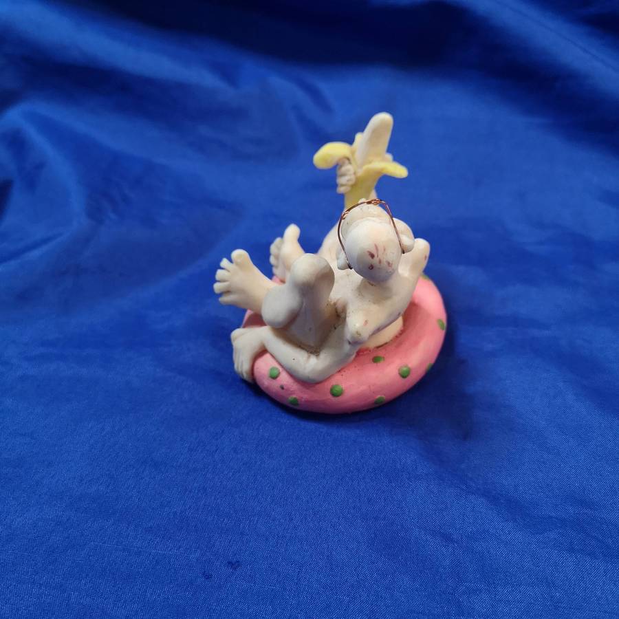 Rare Ornament. "Old Man with a Banana on a Pool Floatie"