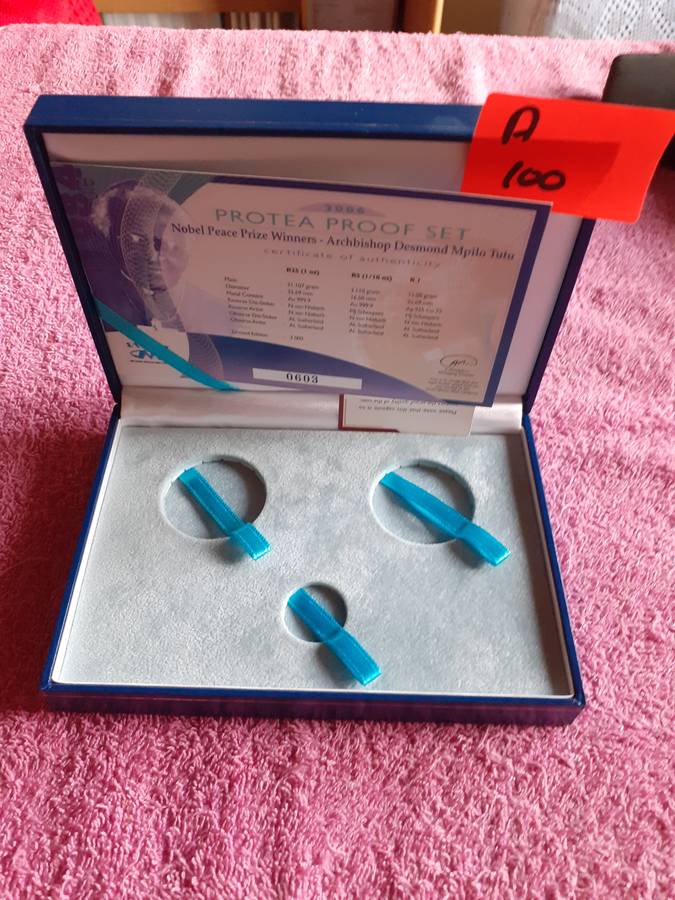 Empty Blue Coin Holder Box. Nobel Peace Prize Winners - Archbishop Desmond Mpilo Tutu