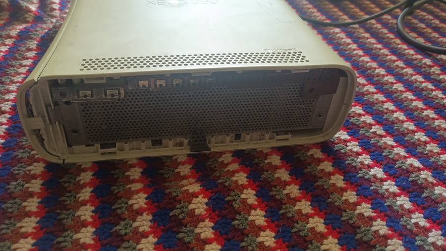 Xbox 360 comes with power supply. But the console is very old