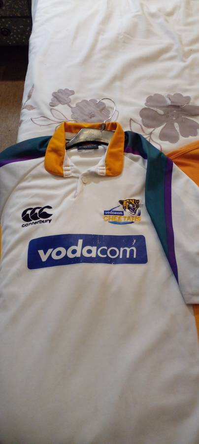 3X CHEETAH RUGBY SHIRTS PLUS A CHEETAH MASCOT TEDDY BEAR. SEE DESC.