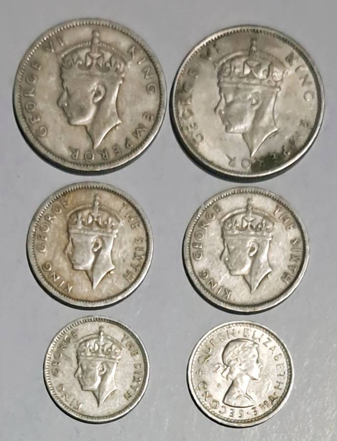 Southern Rhodesia 6 coins  --2 one shilling --2 sixpence -- 2 Threepence coins.