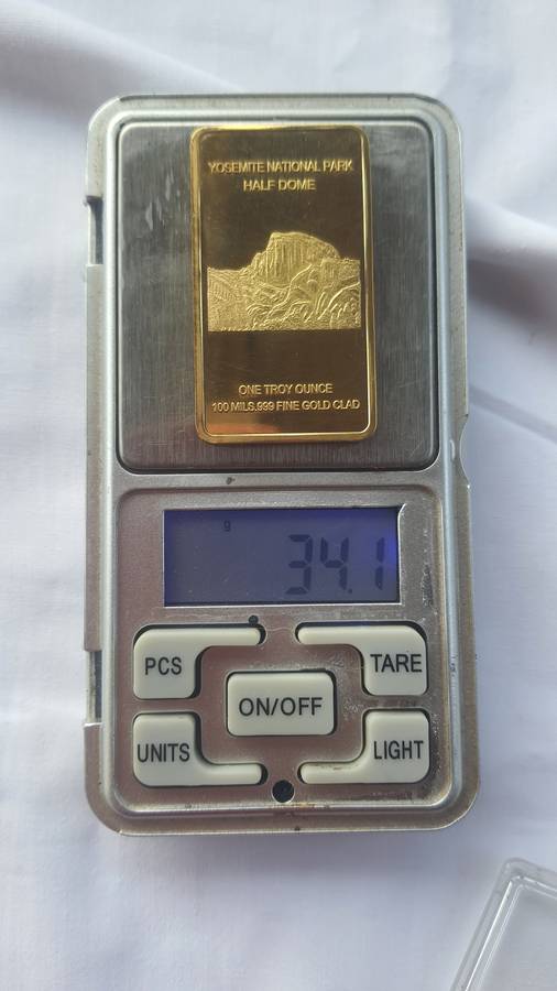 ONE TROY OUNCE 100 MILLS .999 Fine Gold glad bar up for grabs