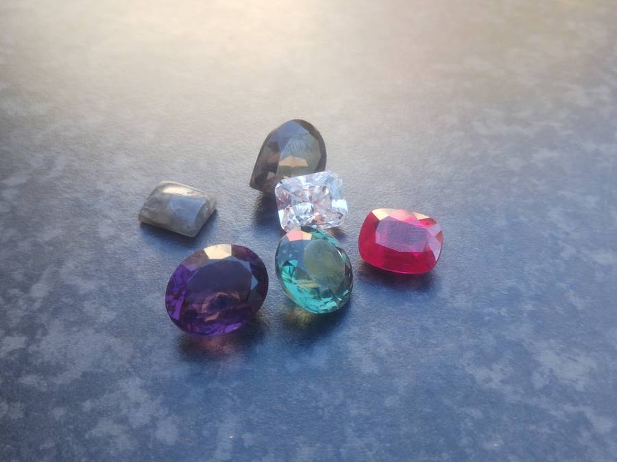 #10 CUT GLASS GEMSTONES - ALTOUGH I THINK THE RUBY MIGHT BE REAL