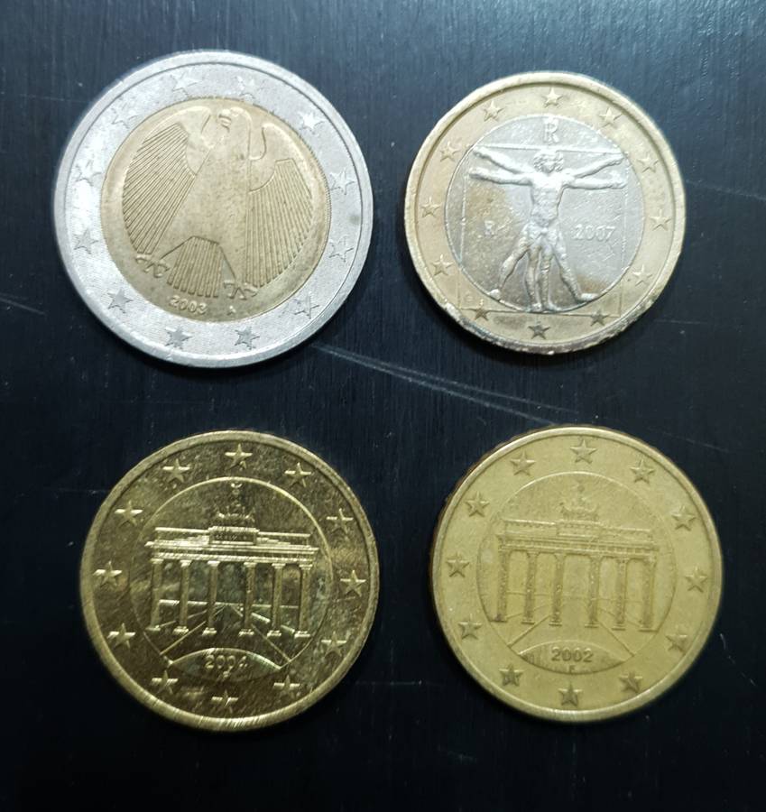 Collection of 4 Euro coins totalling 4 Euro.