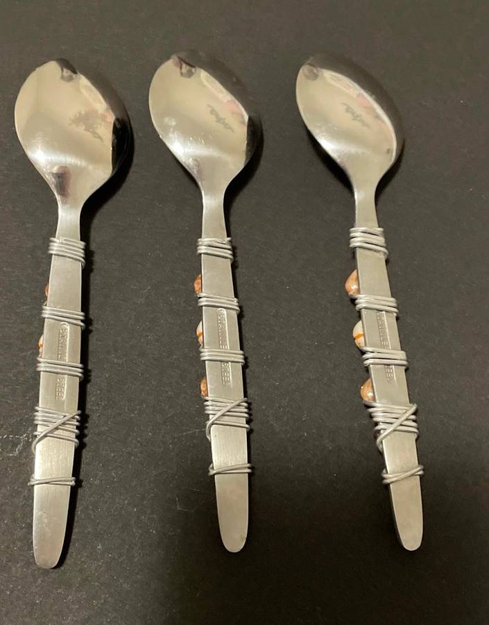 THREE BEAUTIFULLY DECORATED TEASPOONS - STAINLESS STEEL - CORAL COLOURS