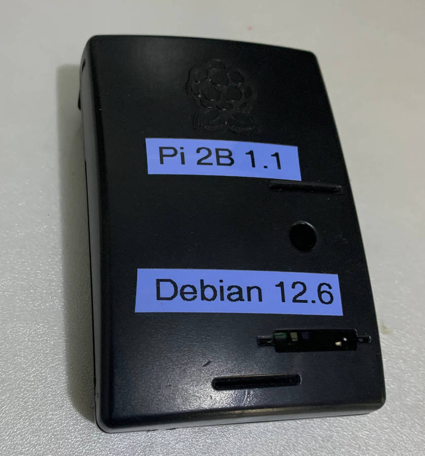 The Raspberry Pi 2 Model B v1.1, 8Gb chip, debian12.6,  with case no PSU