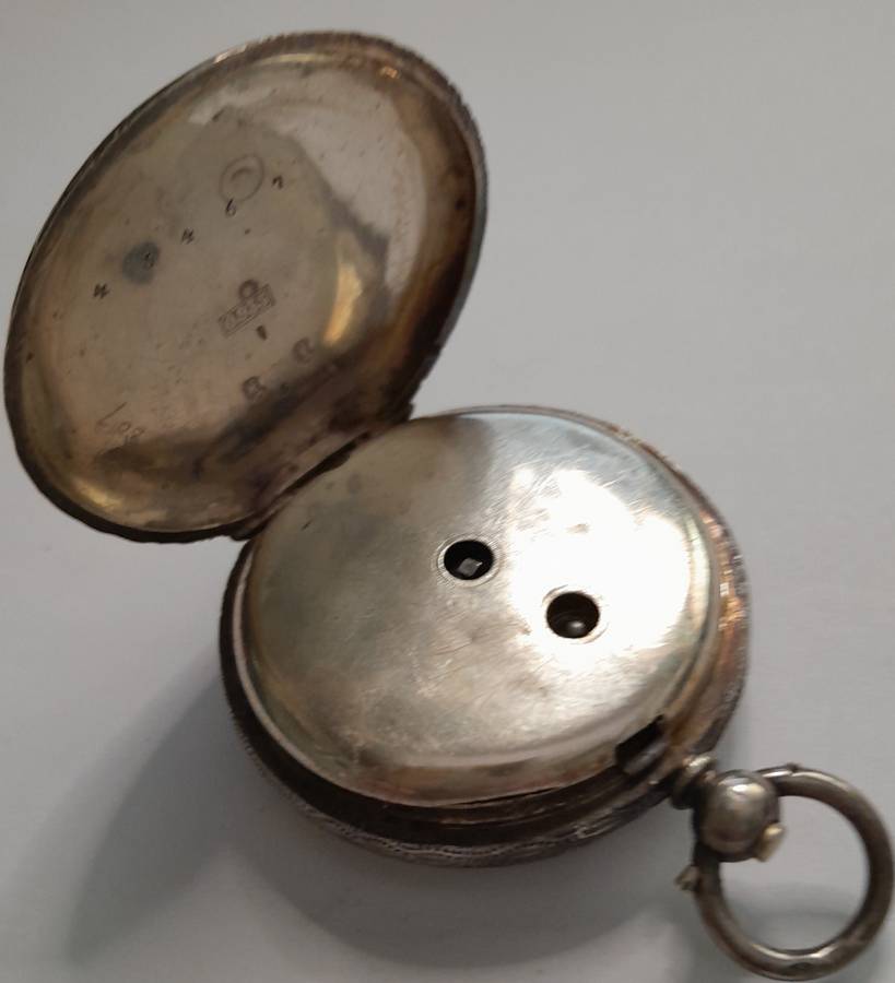 Vintage silver casing decorative and ornate swiss made pocket watch