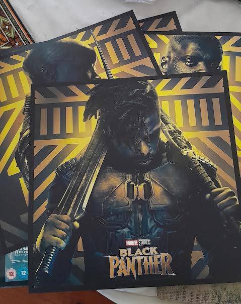 Black Panther Big Sleeve Edition and contains Exclusive 12"Art Cards