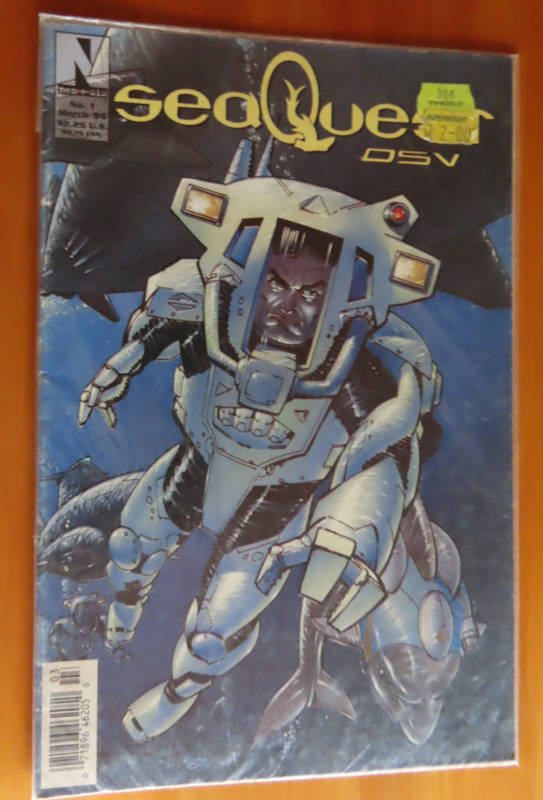 Comics -4 comics in plastic sleeve never read # 6