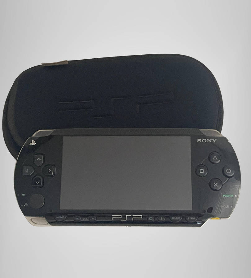 Sony PSP-1004 Portable Console | No Battery | Includes Charger, Sleeve & 8GB Memory Stick | Sold As