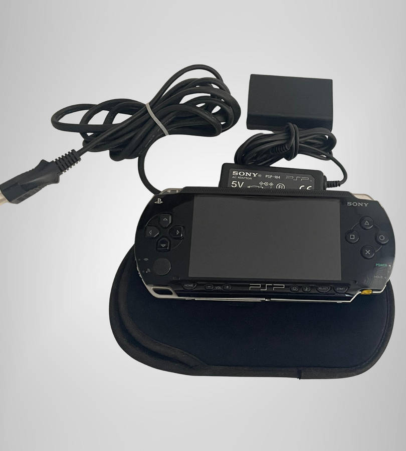 Sony PSP-1004 Portable Console | No Battery | Includes Charger, Sleeve & 8GB Memory Stick | Sold As