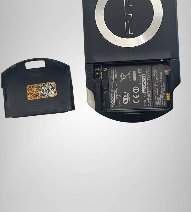 Sony PSP-1004 Portable Console | No Battery | Includes Charger, Sleeve & 8GB Memory Stick | Sold As