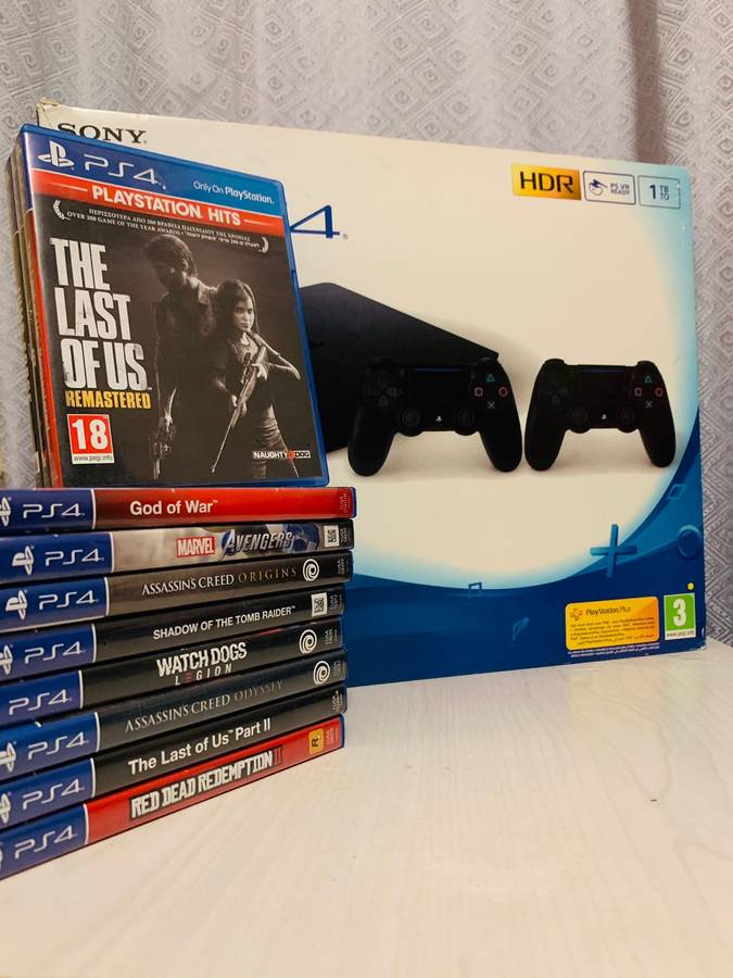 Playstation 4 (1TB HDD) with 2 controllers