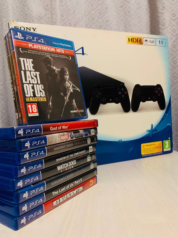 Playstation 4 (1TB HDD) with 2 controllers